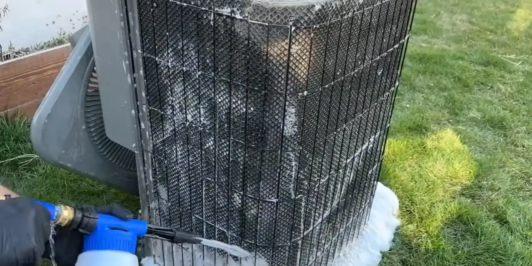 Liberty Air and Electric tech foaming a condenser coil.