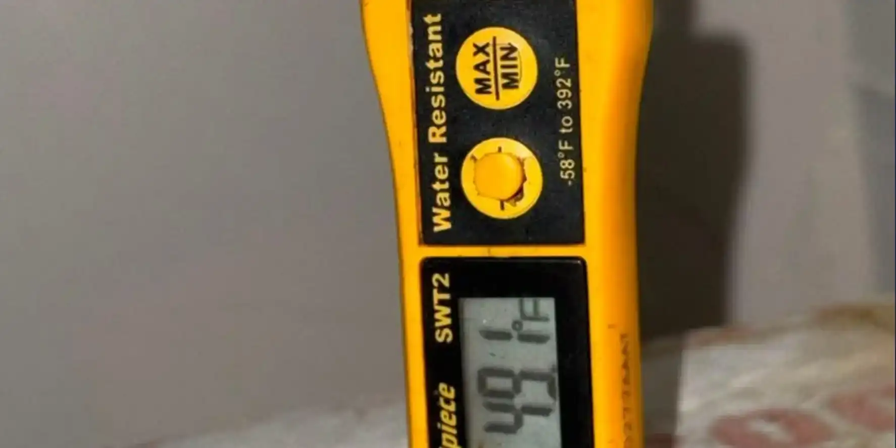 Fieldpiece thermometer reading 49 degree supply air during a Liberty Air and Electric temperature diagnostic.