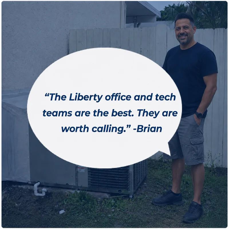 Liberty Air and Electric customer Brian standing next to his outdoor AC condenser at his Florida home.