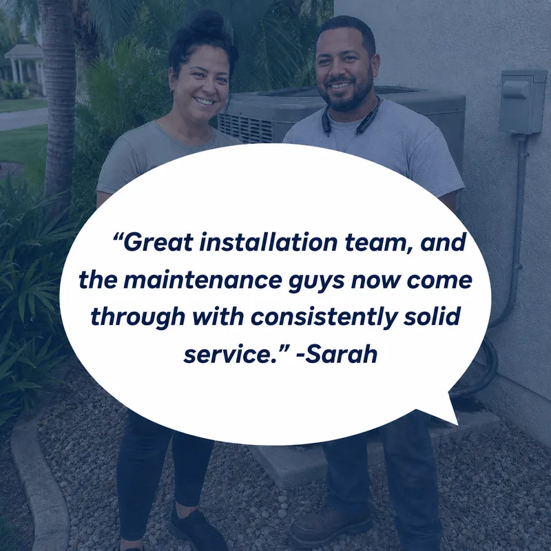 Liberty Air and Electric customer Sarah standing next to a Liberty Air technician beside her outdoor AC condenser.